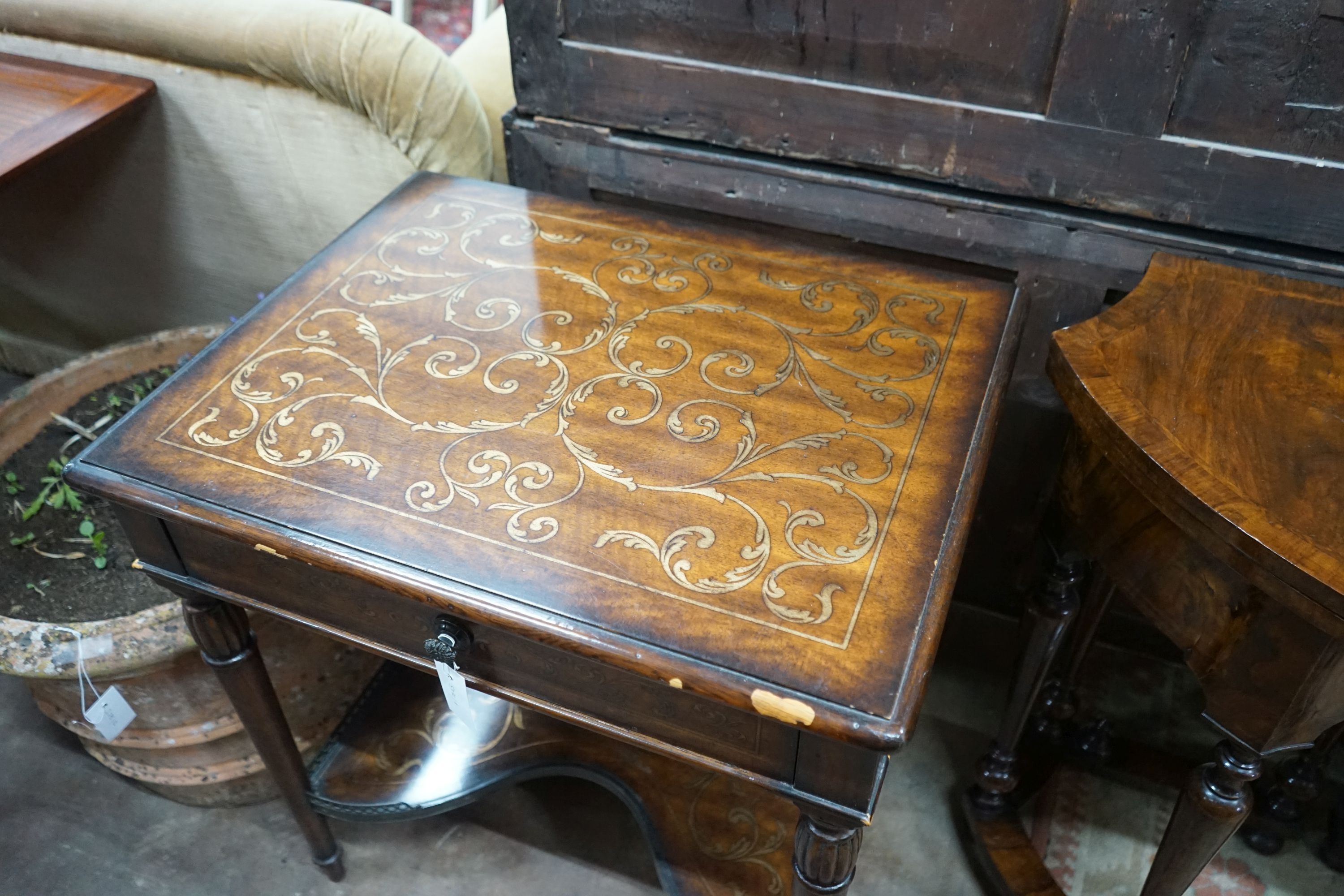 A Theodore Alexander Italian style parcel gilt walnut side table, width 66cm, depth 51cm, height 72cm